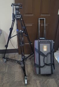 Tripod, wheels attachment, and camera bag, as part of the kit